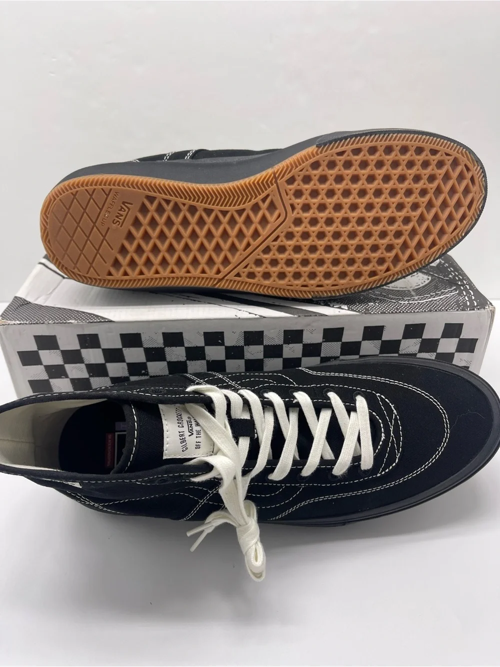 Vans Men’s High-Top Canvas Sneakers in Black and White